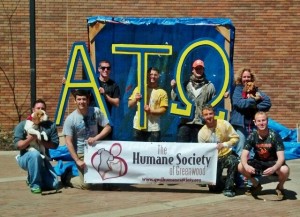 Pictured (Top row l to r):  Kenneth Calliham, James Ivey, Derek Young, Karen Pettay, HSOG Director, with "Remy" (Bottom row): Jonathan Emily, HSOG Adoption Manager, with "Bronson," Luke Vickery, Bradley Beck, Barrett Lollis